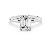 Emerald Cut Diamond Solitaire Engagement Ring Set in Silver with Prong Setting and Polished Band