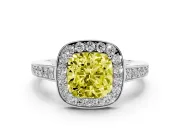 Fancy Yellow Cushion Cut Diamond Halo Pavé Engagement Ring Set in Platinum with Bezel Setting