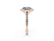 Fancy Blue Oval Cut Diamond Milgrain Floral Halo Engagement Ring Set in Rose gold with Pavé Band