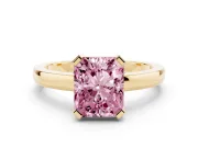 Fancy Pink Radiant Cut Diamond Solitaire Ring Set in Yellow gold with Prong Head and Smooth Polished Band