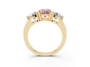 Fancy Pink Oval Cut Diamond Three-Stone Ring Set in Yellow gold with Prong Setting and Classic Band