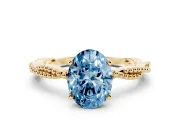 Fancy Blue Oval Cut Diamond Solitaire Ring Set in Yellow gold with Twisted Band and Bead Prong Setting