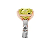 Fancy Yellow Princess Cut Diamond Solitaire Set in Rose gold with Side Baguettes and Channel Set Band