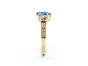 Pear-Shaped Three Stone Engagement Ring Setting for a Fancy Blue Lab-Grown Diamond | Graduated Pave Band | Yellow Gold