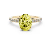 Fancy Yellow Oval Cut Diamond Pavé Band Ring Set in Yellow gold with Prong-Set Center Stone