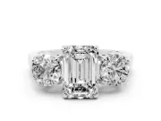 Emerald Cut Three Stone Engagement Ring Setting | Round Side Stones and Open Baskets | White Gold