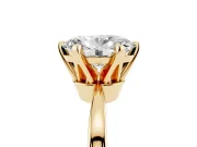 Oval Cut Diamond Solitaire Engagement Ring Set in Yellow gold with Slim Tapered Solitaire Band