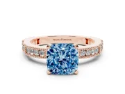 Fancy Blue Cushion Cut Diamond Solitaire Ring Set in Rose gold with Slim Pavé Band and Prong Setting