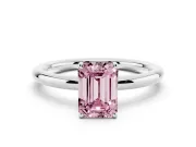Fancy Pink Emerald Cut Diamond Solitaire Ring Set in Platinum with Prong Setting on a Polished Plain Band