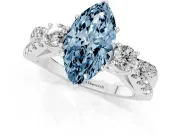 Fancy Blue Marquise Cut Diamond Three-Stone Ring Set in Platinum with Pavé Split Shank and Prong Setting