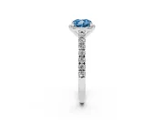 Fancy Blue Cushion Cut Diamond Halo Engagement Ring Set in Silver with Pavé Band and Prong Setting