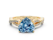 Fancy Blue Heart Cut Diamond Solitaire Engagement Ring Set in Yellow gold with Twisted Pavé Band and Prong Setting