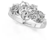 Heart Cut Diamond Three-Stone Ring Set in Silver with Milgrain Band
