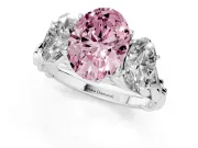Fancy Pink Oval Cut Diamond Three-Stone Ring Set in Silver with Braided Band