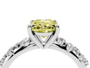Fancy Yellow Oval Cut Diamond Solitaire Vine Band Ring Set in White gold with Round Accents and Prong Setting