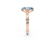 Fancy Blue Marquise Cut Diamond Solitaire Twisted Band Ring Set in Rose gold with Accent Stones and Prong Setting