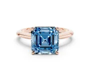 Fancy Blue Asscher Cut Diamond Solitaire Ring Set in Rose gold with Prong Setting on a Plain Round Band