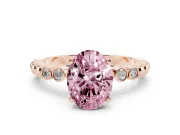Fancy Pink Oval Cut Diamond Solitaire Engagement Ring Set in Rose gold with Bezel Accents on Beaded Band