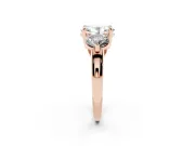 Oval Cut Diamond Three-Stone Ring Set in Rose gold with Prong Setting and Classic Band