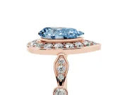Fancy Blue Pear Cut Diamond Halo Engagement Ring Set in Rose gold with Twisted Band and Prong Setting