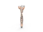 Heart Cut Diamond Solitaire Engagement Ring Set in Rose gold with Twisted Pavé Band and Prong Setting