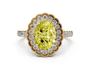 Fancy Yellow Oval Cut Diamond Milgrain Floral Halo Engagement Ring Set in Yellow gold with Pavé Band