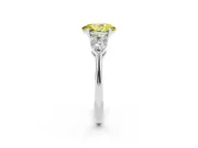 Fancy Yellow Three-Stone Oval Cut Diamond Ring Set in Silver with Pear Side Stones and Prong Setting