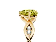Fancy Yellow Heart Cut Diamond Twist Band Solitaire Ring Set in Yellow gold with Leaf Prong Setting and Accent Stones