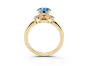 Fancy Blue Three-Stone Round Cut Diamond Ring Set in Yellow gold with Prong Setting and Plain Band