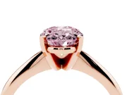 Fancy Pink Oval Cut Diamond Solitaire Ring Set in Rose gold with Prong Setting on a Plain Round Band