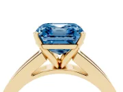 Fancy Blue Asscher Cut Diamond Solitaire Ring Set in Yellow gold with Channel-Set Band and Prong Setting
