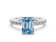 Fancy Blue Emerald Cut Diamond Solitaire Set in Silver with Round Pavé Band and Prong Setting