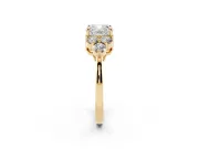 Cushion Cut Diamond Solitaire Ring Set in Yellow gold with Cluster Accents on Each Side