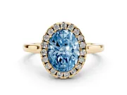 Fancy Blue Oval Cut Halo Round Diamond Solitaire Ring Set in Yellow gold with Pavé Band and Prong Setting