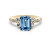 Emerald Cut Side Stone Engagement Ring Setting for a Fancy Blue Lab-Grown Diamond | Pave Band | Yellow Gold
