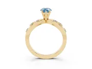 Fancy Blue Pear Cut Diamond Solitaire Ring Set in Yellow gold with Side Stones on Criss-Cross Band and Prong Setting
