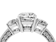 Cushion Cut Diamond Three-Stone Ring Set in Silver with Round Side Stones and Pavé Band