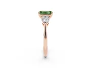 Fancy Green Three-Stone Emerald Cut Diamond Ring Set in Rose gold with Pear Side Stones and Prong Setting