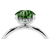 Fancy Green Round Cut Diamond Solitaire Engagement Ring Set in Platinum with Prong Setting and Polished Band