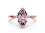 Fancy Pink Marquise Cut Diamond Solitaire Ring Set in Rose gold with Twisted Band and Bead Prong Setting