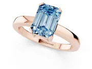Fancy Blue Emerald Cut Diamond Solitaire Ring Set in Rose gold with Prong Head and Smooth Polished Band
