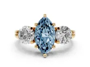 Fancy Blue Marquise Cut Diamond Three-Stone Ring Set in Yellow gold with Prong Setting and Classic Band