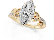 Marquise Cut Diamond Solitaire Leaf-Inspired Ring Set in Yellow gold with Pavé Band and Prong Setting