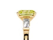 Fancy Yellow Emerald Cut Diamond Solitaire Ring Set in Yellow gold with Tapered Baguette Accents and Prong Setting