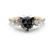 Fancy Black Heart Cut Diamond Three-Stone Ring Set in Yellow gold with Pavé Band and Graduated Sides