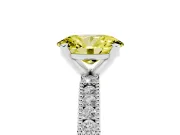 Fancy Yellow Oval Cut Diamond Solitaire Ring Set in Silver with Slim Pavé Band and Prong Setting