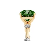 Fancy Green Cushion Cut Diamond Solitaire Ring Set in Yellow gold with Bezel Set Side Stones and Prong Setting