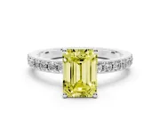 Fancy Yellow Emerald Cut Diamond Solitaire Set in Silver with Round Pavé Band and Prong Setting