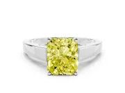 Fancy Yellow Radiant Cut Diamond Solitaire Engagement Ring Set in Platinum with Prong Setting and Tapered Band