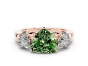 Fancy Green Heart Cut Diamond Three-Stone Ring Set in Rose gold with Bold Center and Classic Band